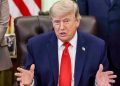 Federal Reserve Chairman Kevin Warsh speaks after the Fed keeps interest rates unchanged, signaling that borrowing costs may remain higher for longer amid inflation concerns.